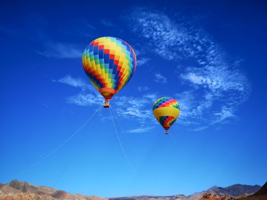 TWO HOT AIR BALLOONS andy-wong-1347662-unsplash